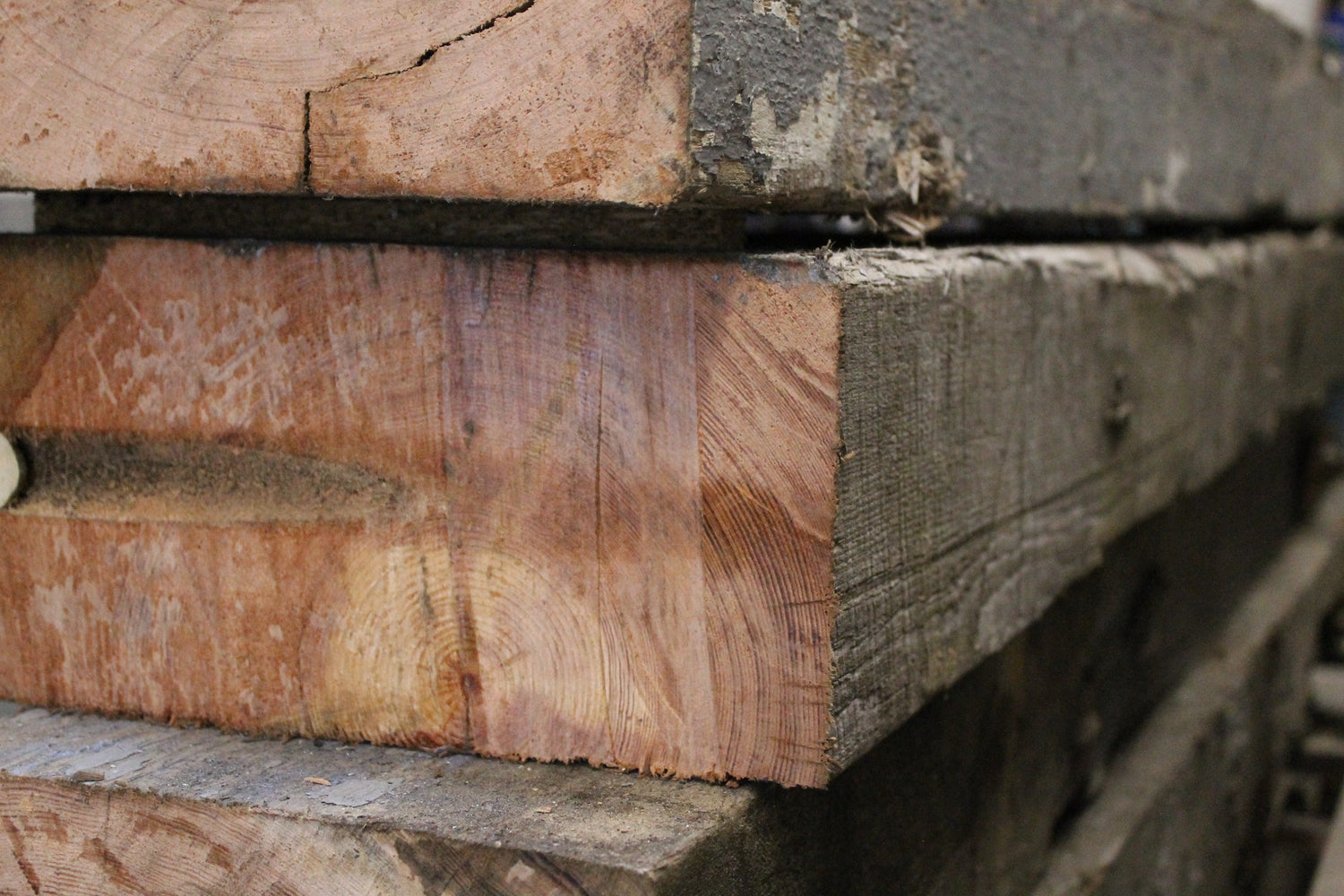 Reclaimed pine joists showing wood grain
