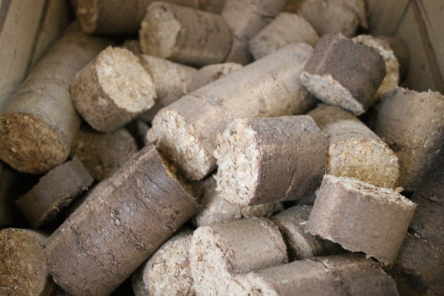 Sawdust briquettes made from wooden floorboard byproduct